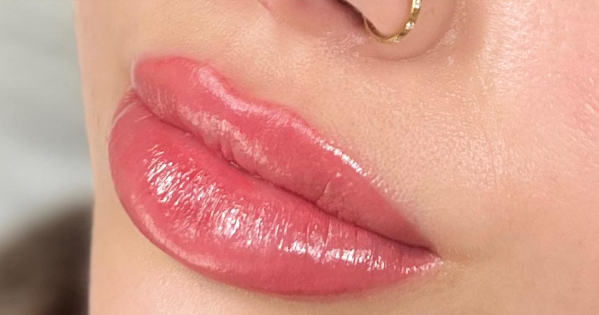 Close-up of Glossy, Pink Lips e — Artisan Cosmetic Tattoo & Beauty in Worongary, QLD