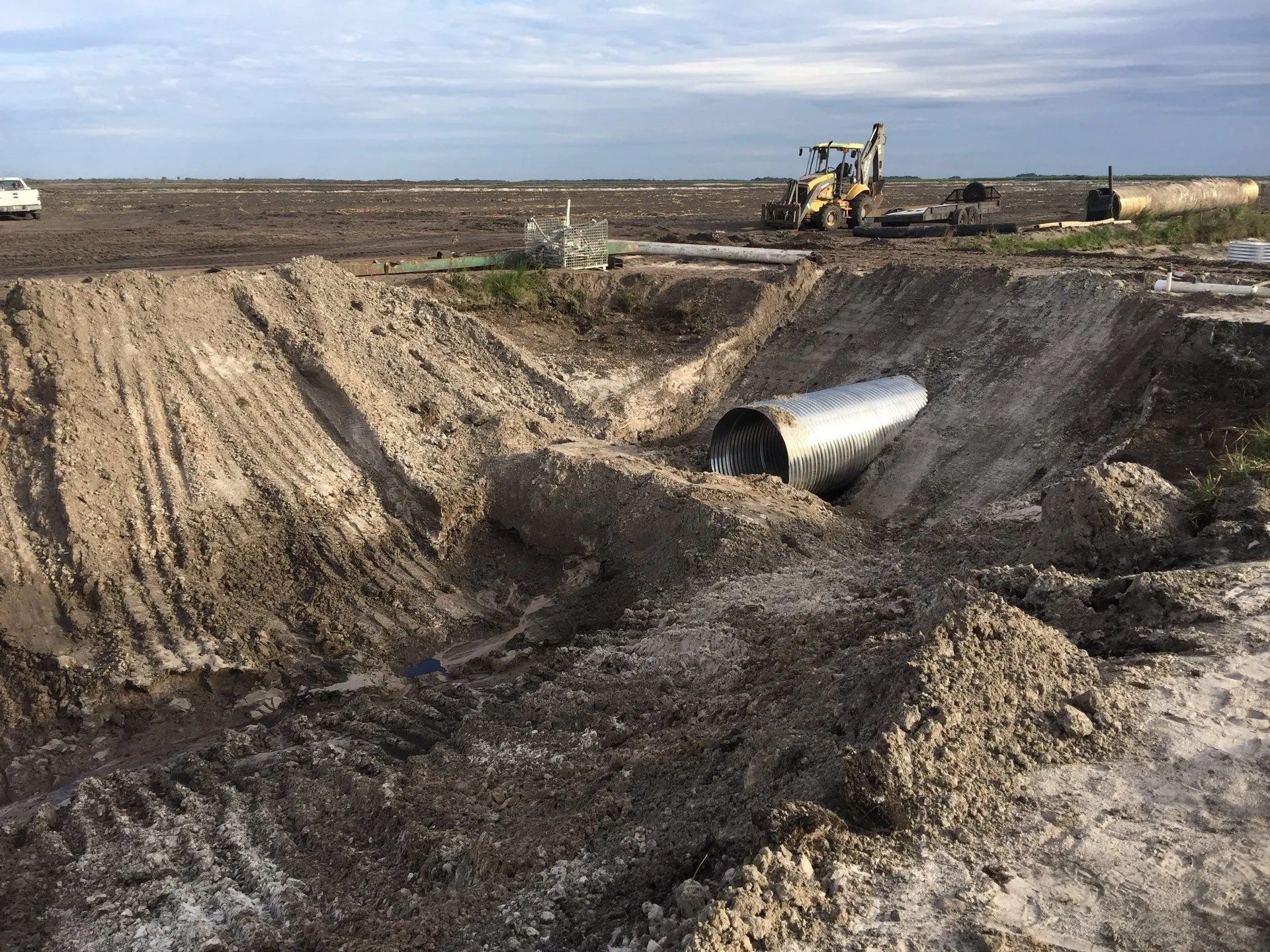 Excavation For Installing Underground Pipes — Clewiston, FL — Ridgdill & Son