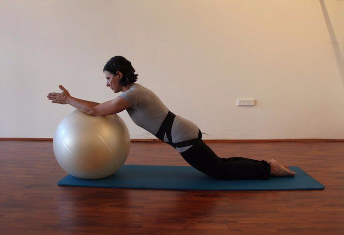 Women working out with exercise ball