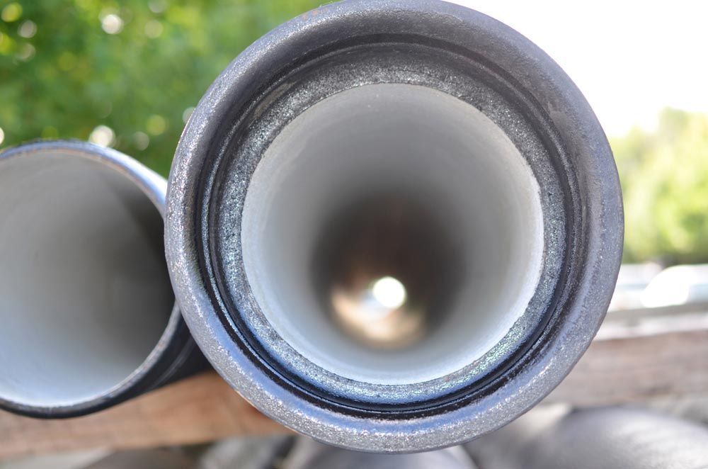 A Close Up of a Pipe With a Hole in the Middle — Tony Brown Plumbing & Gas Services in South Grafton, NSW