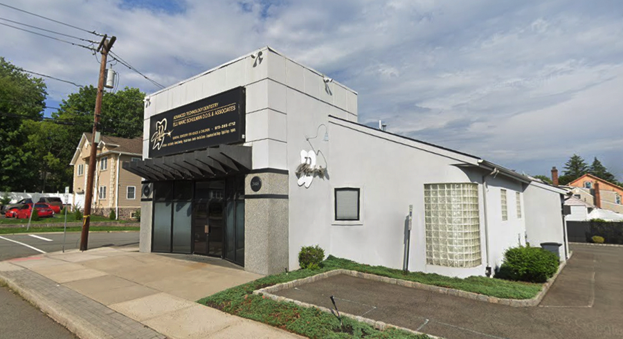 Exterior view of Club 32 Advanced Technology Dentistry located in Clifton, NJ, showcasing the modern facility where comprehensive dental services are provided.
