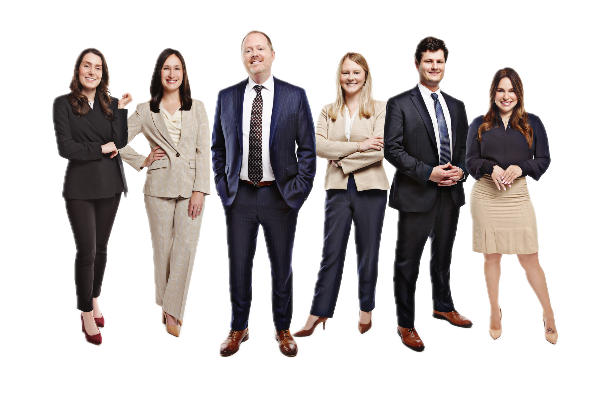 Five professionals in business attire stand together, smiling, against a white background.