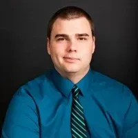 A blue sign that says picture coming soon