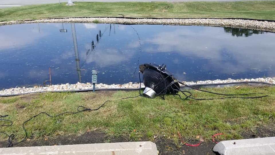 Machine Beside Pond — Chesterton, IN — Lake & Pond Biologists LLC