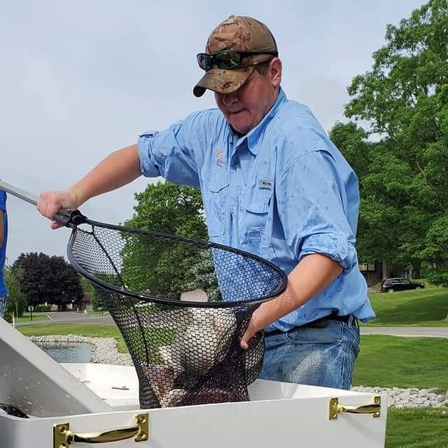 Man Checking the Fish — Chesterton, IN — Lake & Pond Biologists LLC