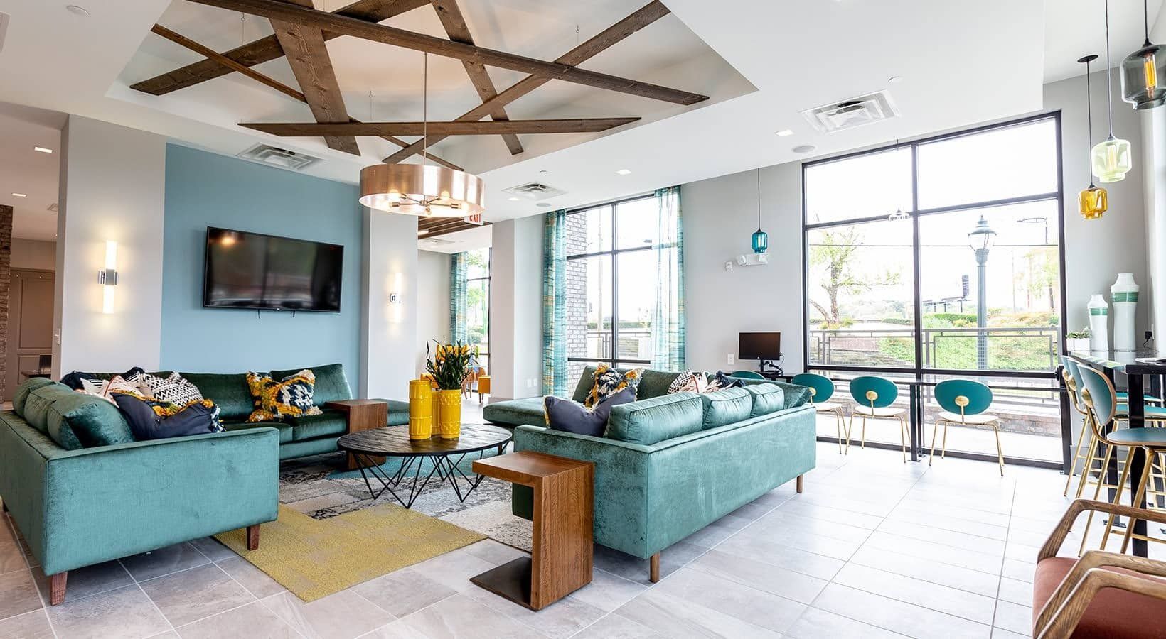 Resident Lounge with TV, Sofa, and Window Side  Seating | 2050 Morningside