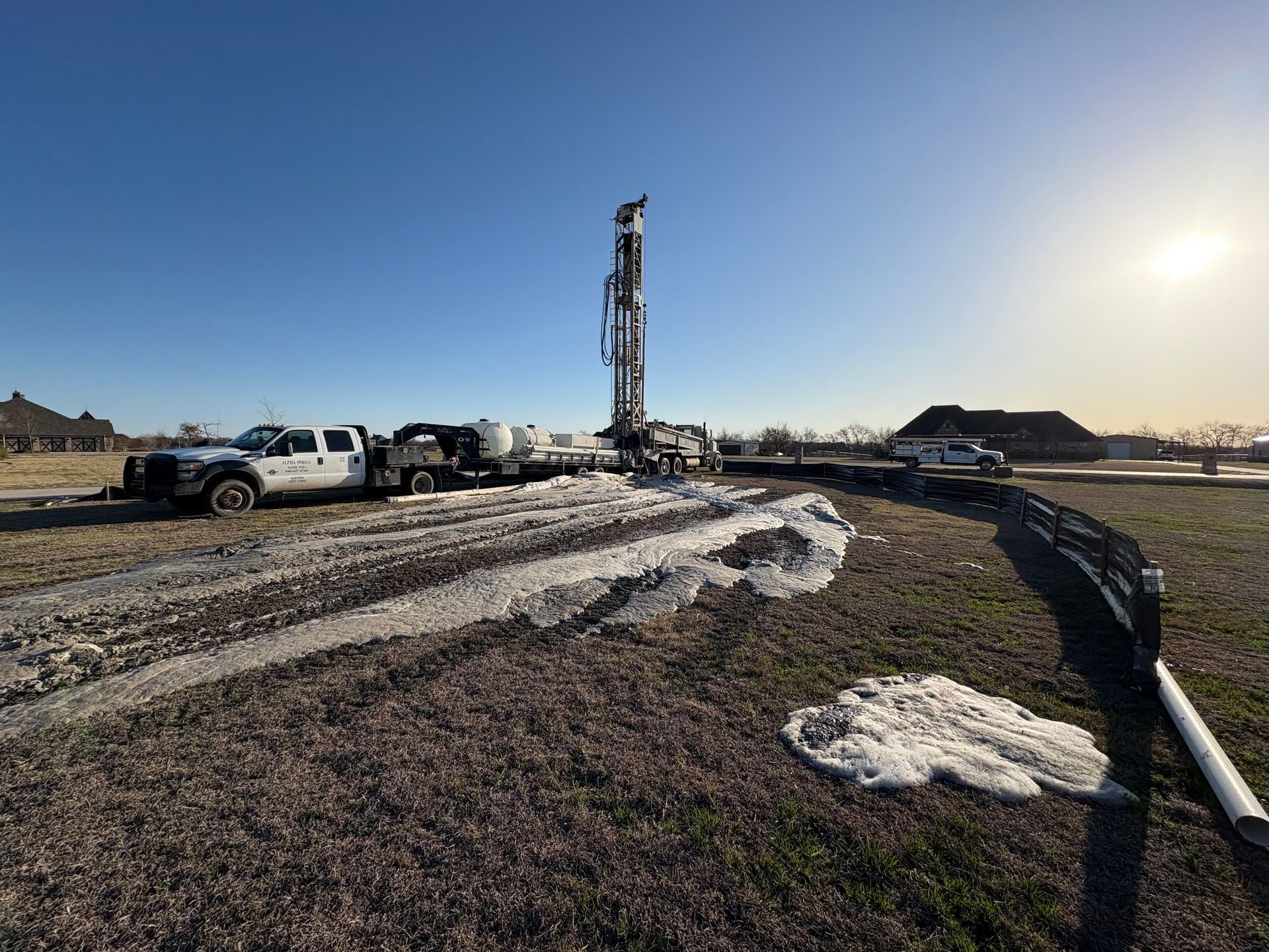 A machine is drilling a hole in the ground.