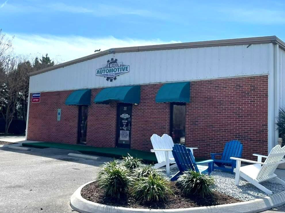 A building with a lot of chairs in front of it