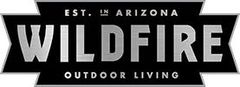 Logo for Wildfire Outdoor Living, established in Arizona, silver text on black background.