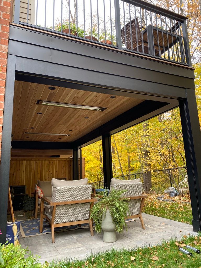 Waterproofed deck with, basement level patio, outdoor heaters, motorized bug screens and Cedar t&g ceiling.