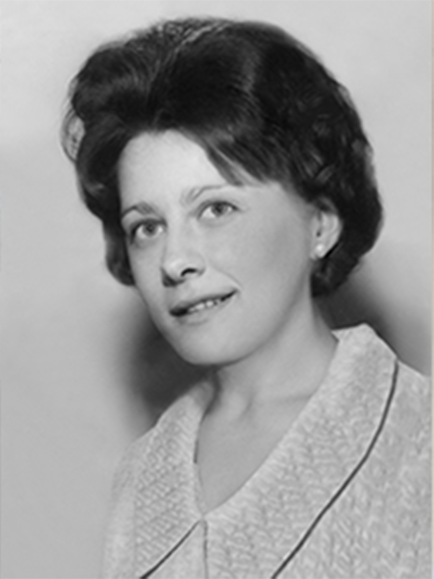 A black and white photo of a woman in a white shirt