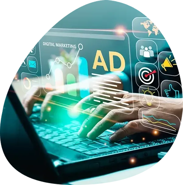 A person is typing on a laptop computer.