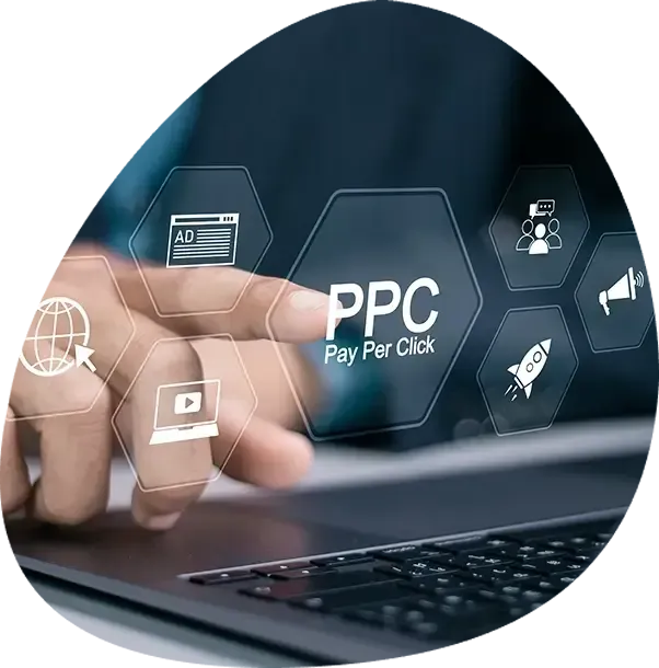A person is using a laptop computer with a ppc pay per click icon on the screen.