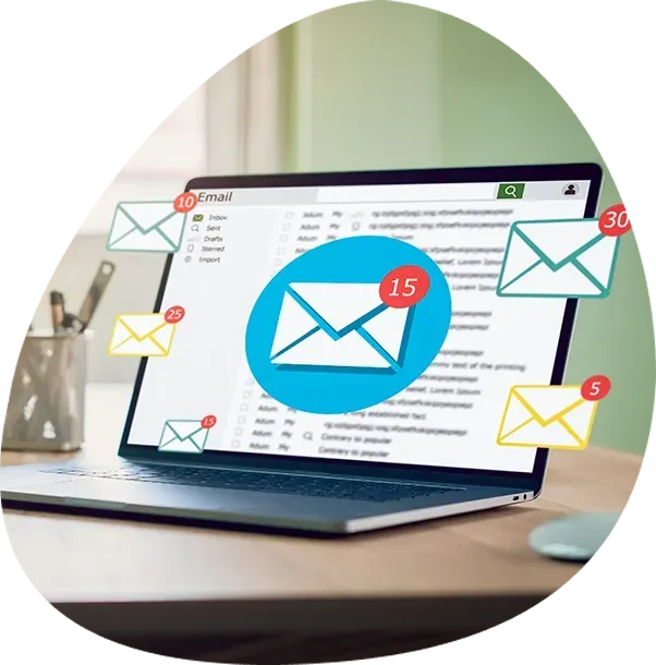 A laptop with a blue envelope on the screen