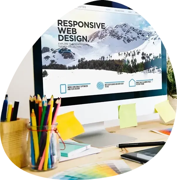 A computer monitor displays a website for responsive web design