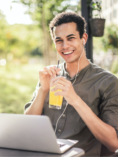 Aboriginal boy sitting in front of a laptop doing his Foundation Skills Training in New South Wales