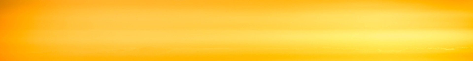 un primo piano di uno sfondo giallo con un effetto sfocato.