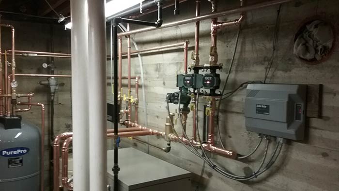 Side View of Boilers — Middlebury, VT — Plouffe's Boiler & Mechanical Service Inc