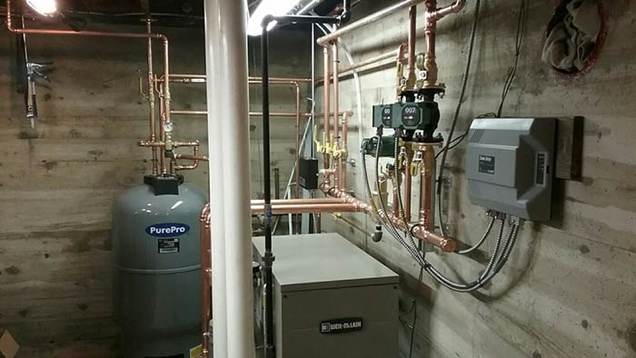 Front View of Heating and Boilers — Middlebury, VT — Plouffe's Boiler & Mechanical Service Inc