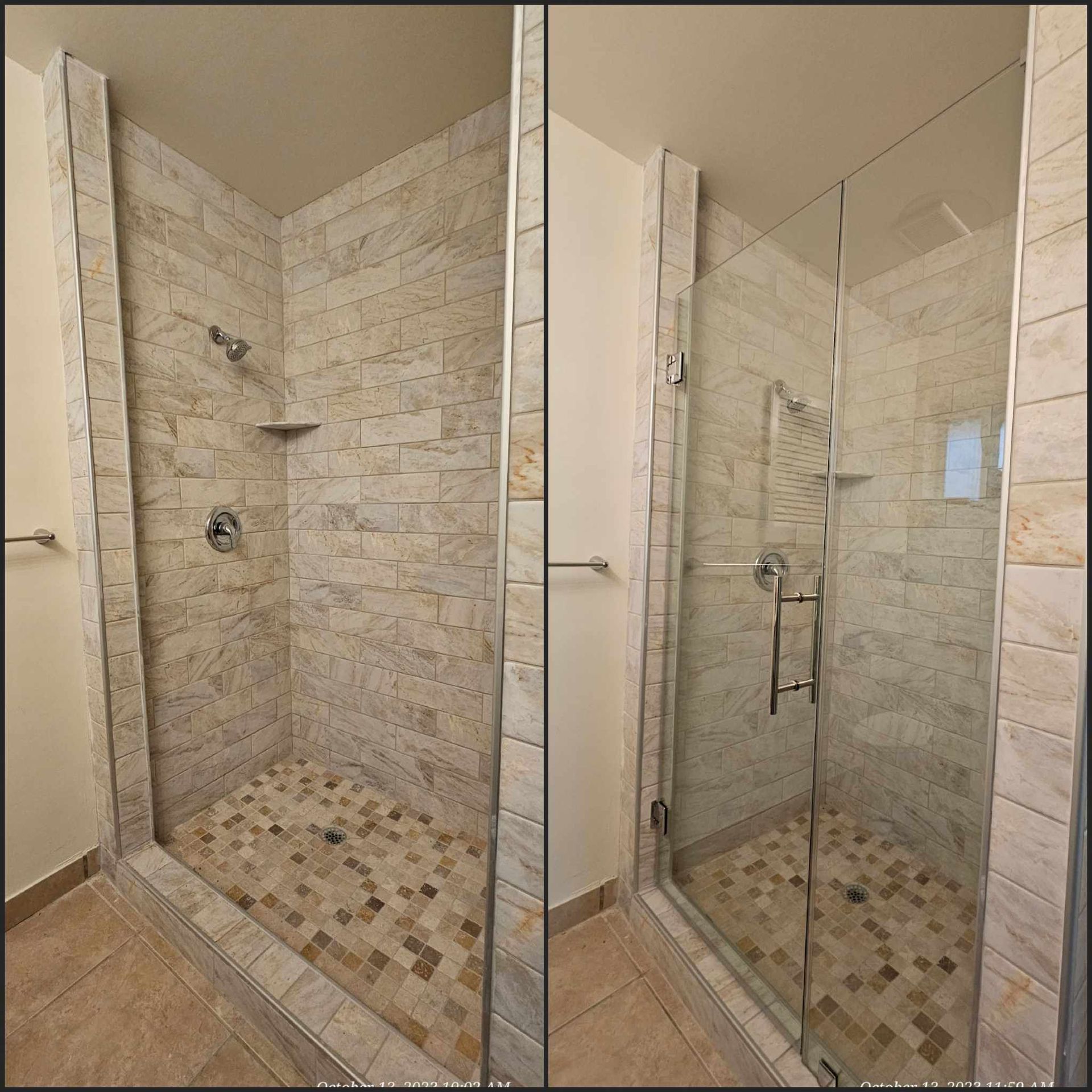 Shower stall with stone tile walls, pebble floor, and glass door.