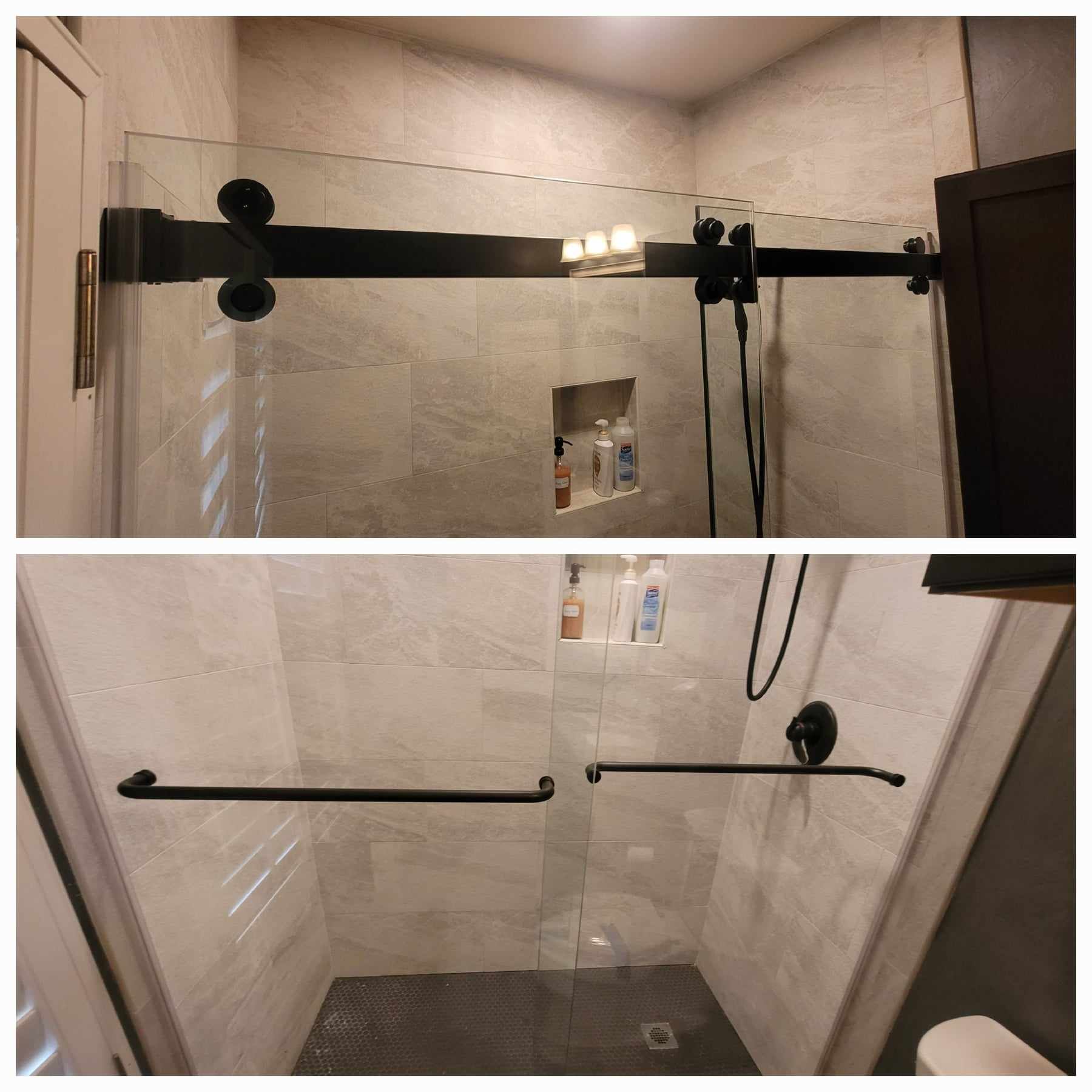 Black framed sliding glass shower door with gray tiled walls.