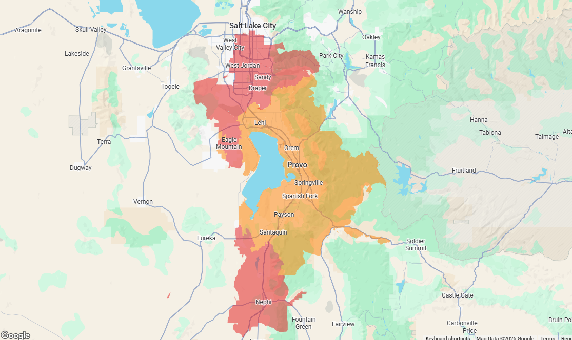 Map of Salt Lake City, Utah, with areas highlighted in red, orange, and tan, centered around a lake.