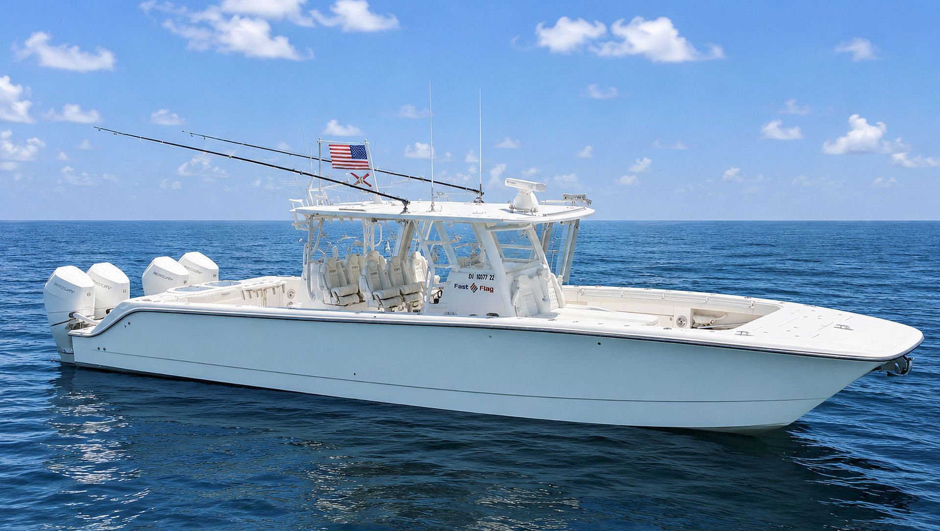 White center console fishing boat cruising on blue ocean under a clear sky