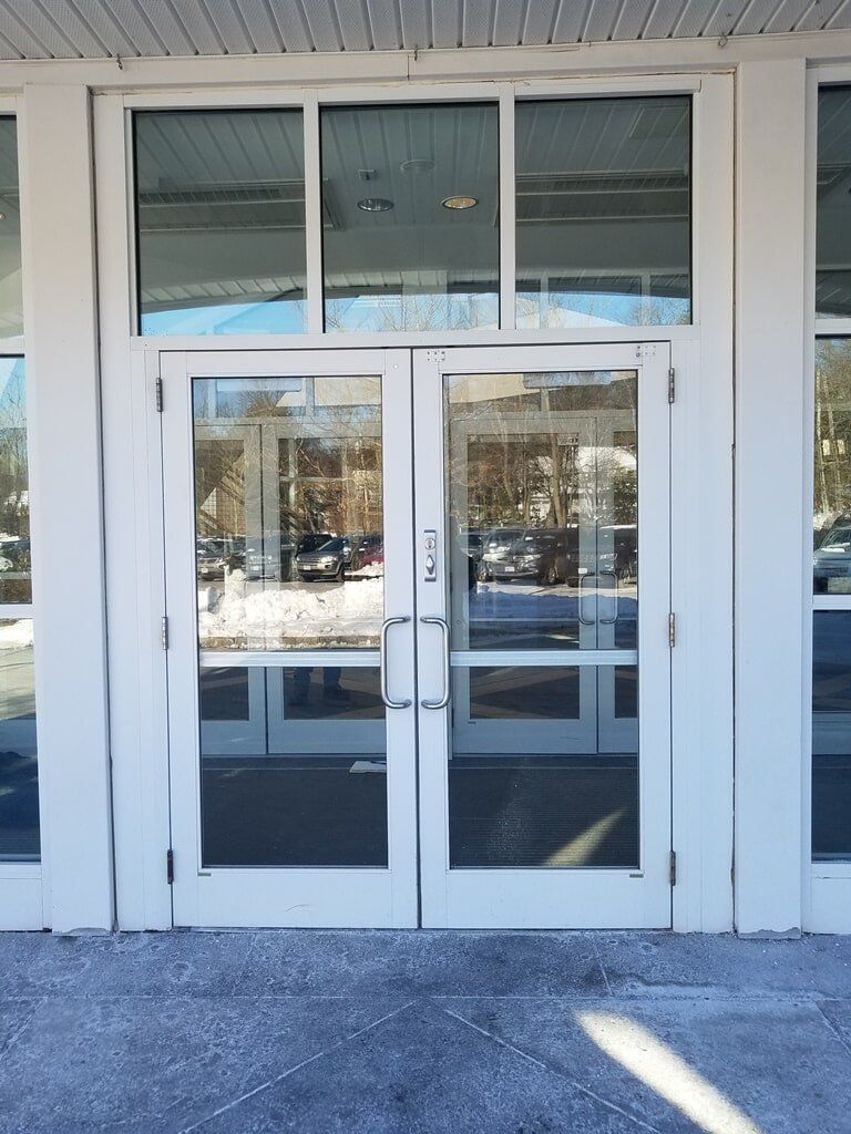 Glass Double Doors with a Metal Door Handle — Methuen, MA — Methuen Glass 2