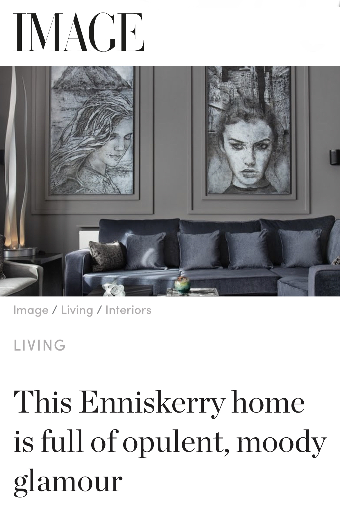 Magazine feature of an opulent decor living room with dark and moody furnishings and monochrome art.