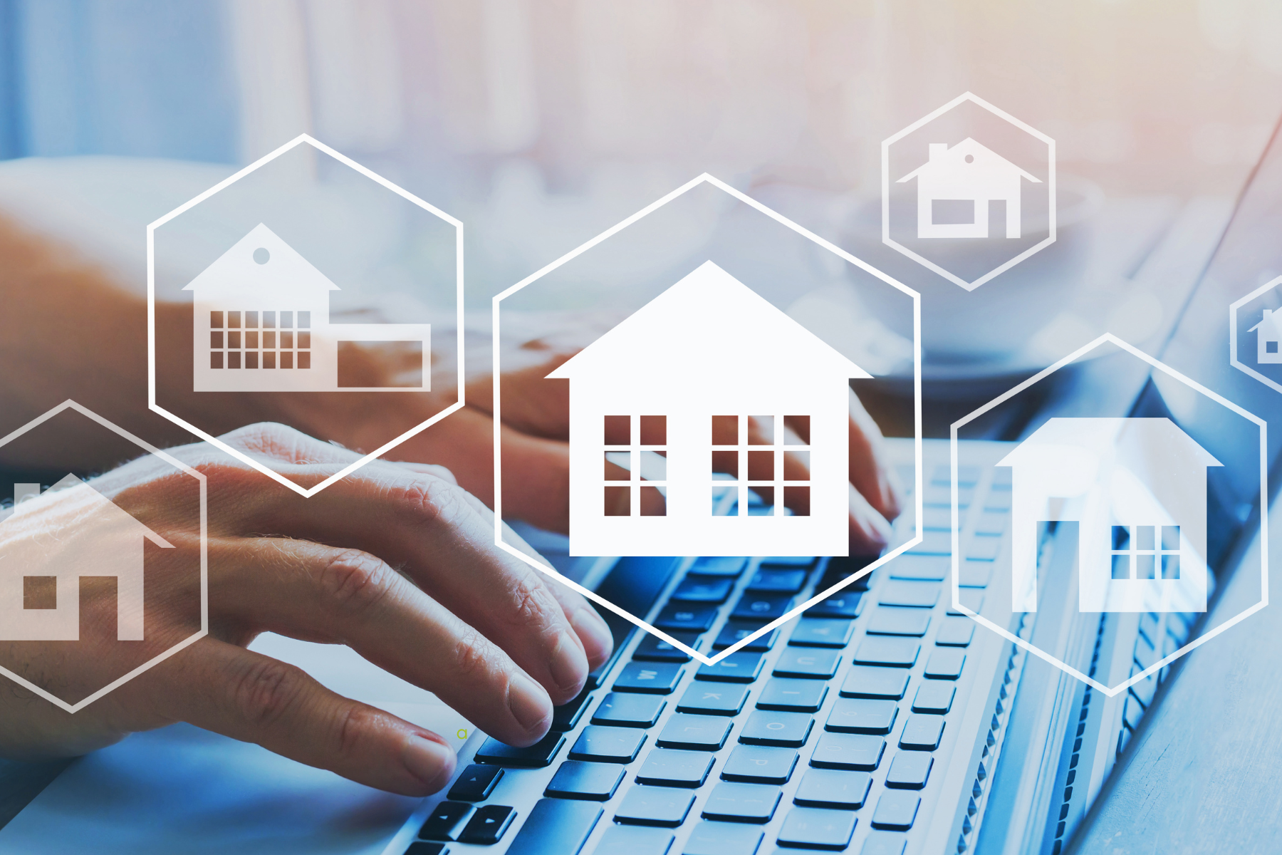 Person on a laptop searching for homes