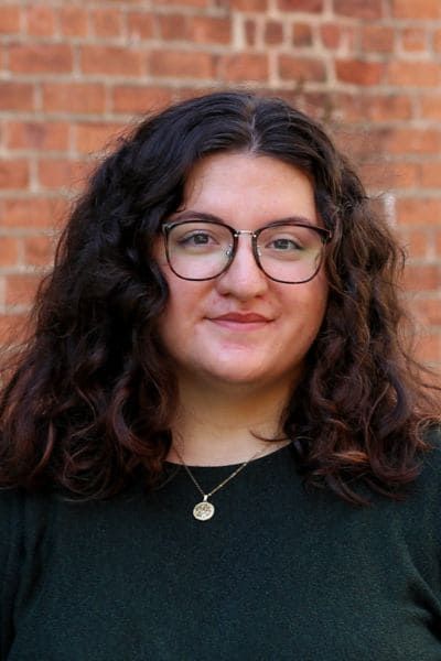 Alex Strimbu headshot, tour guide at Tasty Tours NYC