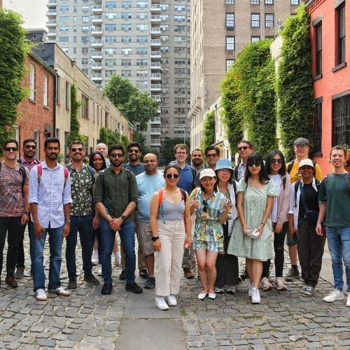 Corporate team standing in Washington Mews, Greenwich Village.