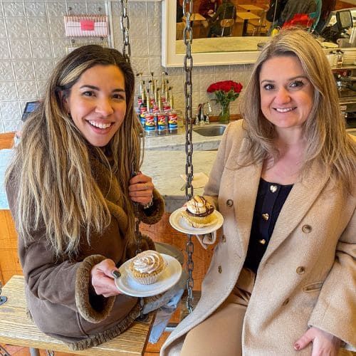 Tour guests enjoying cupcakes at Molly’s Cupcakes in Greenwich Village, NYC