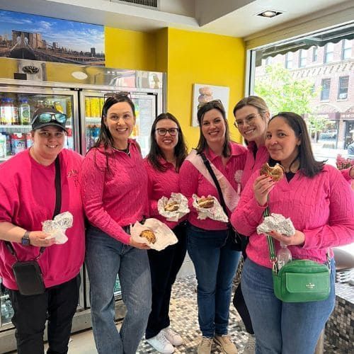 Guests enjoying fresh bagels at Bagel Bob’s in Greenwich Village