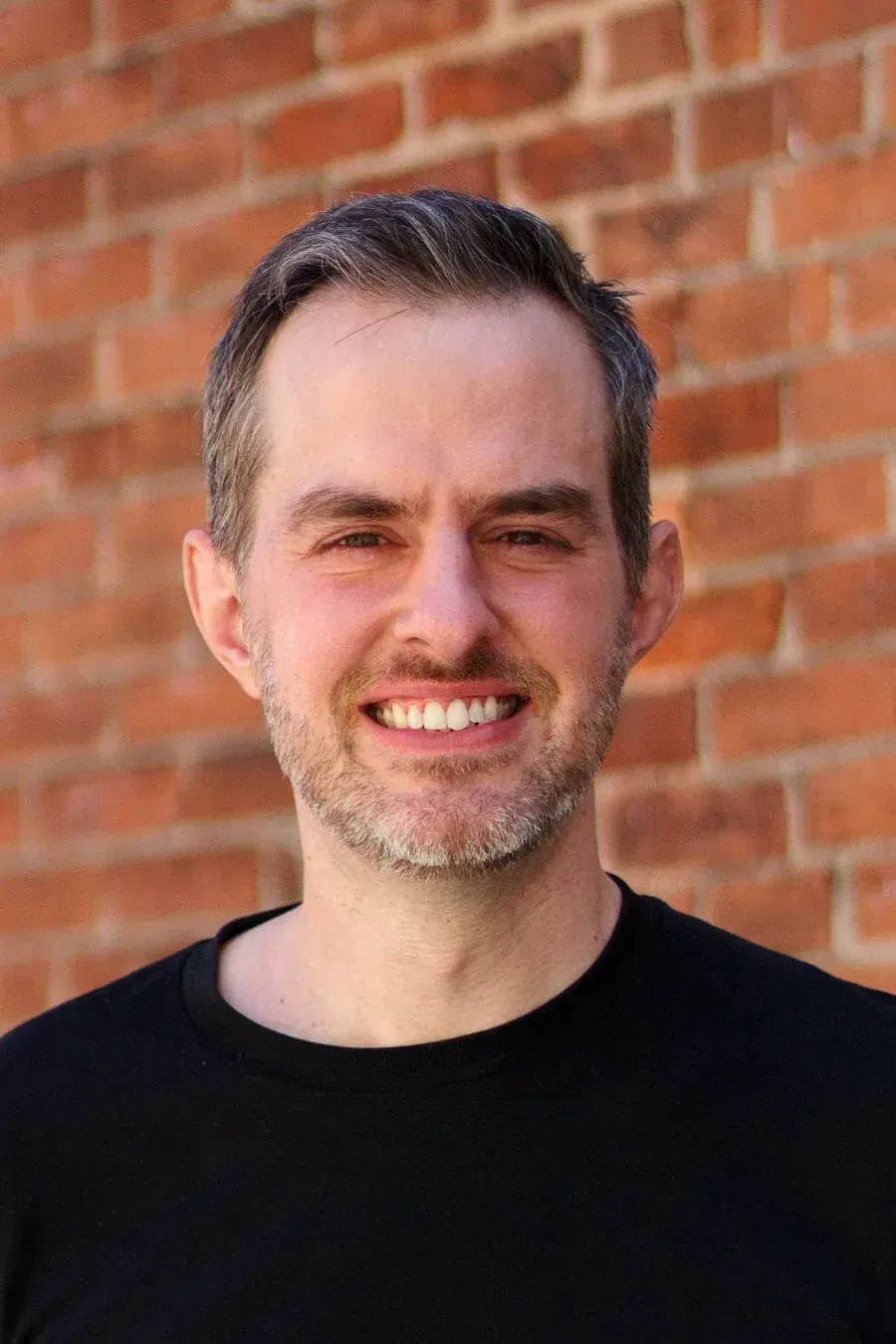 David Frasure headshot, tour guide at Tasty Tours NYC