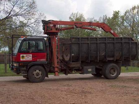 Grapple truck owned by Brown's Tree Care