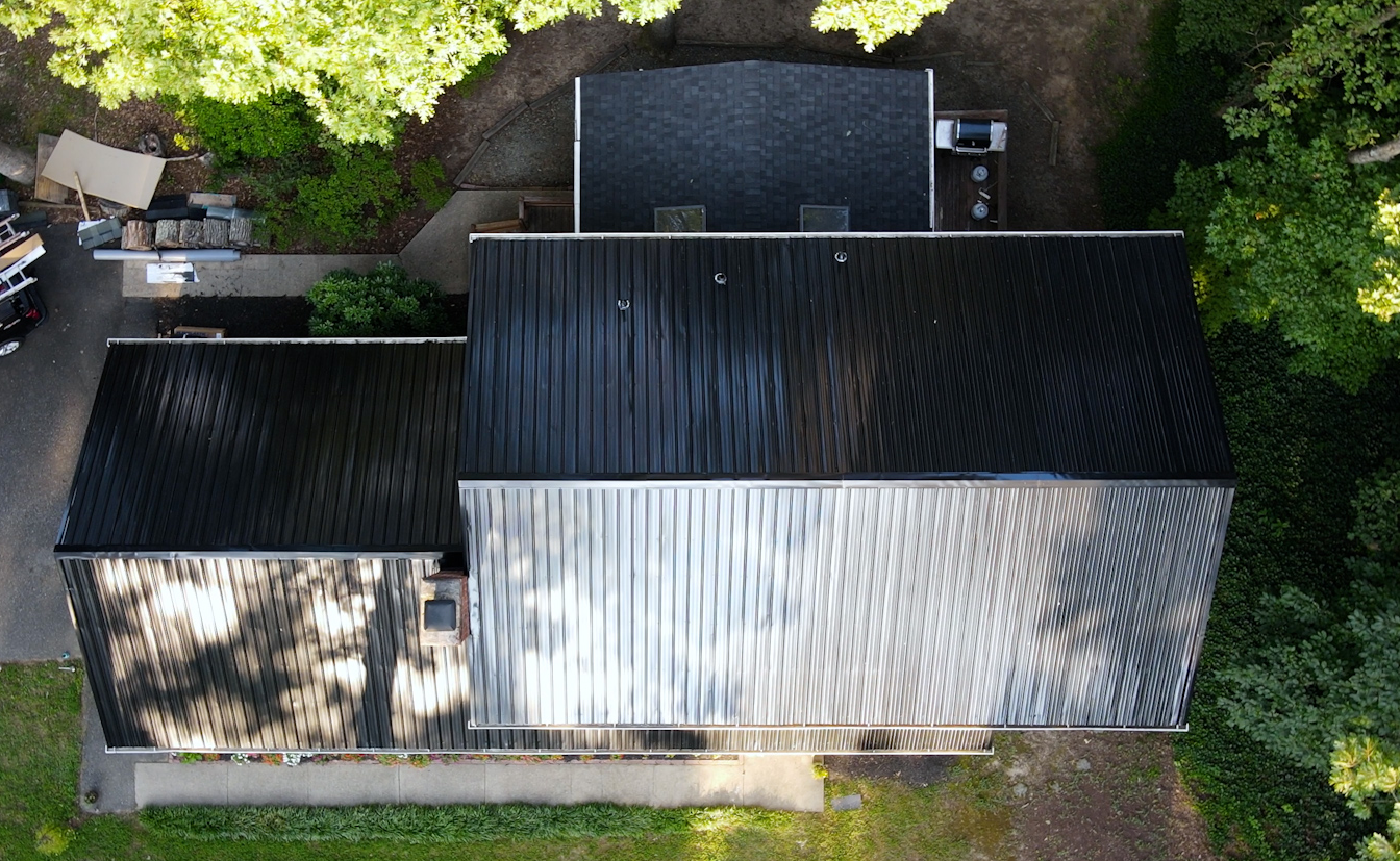 Drone image of RETEX black ribbed metal roof installation in North Chesterfield VA 23235.