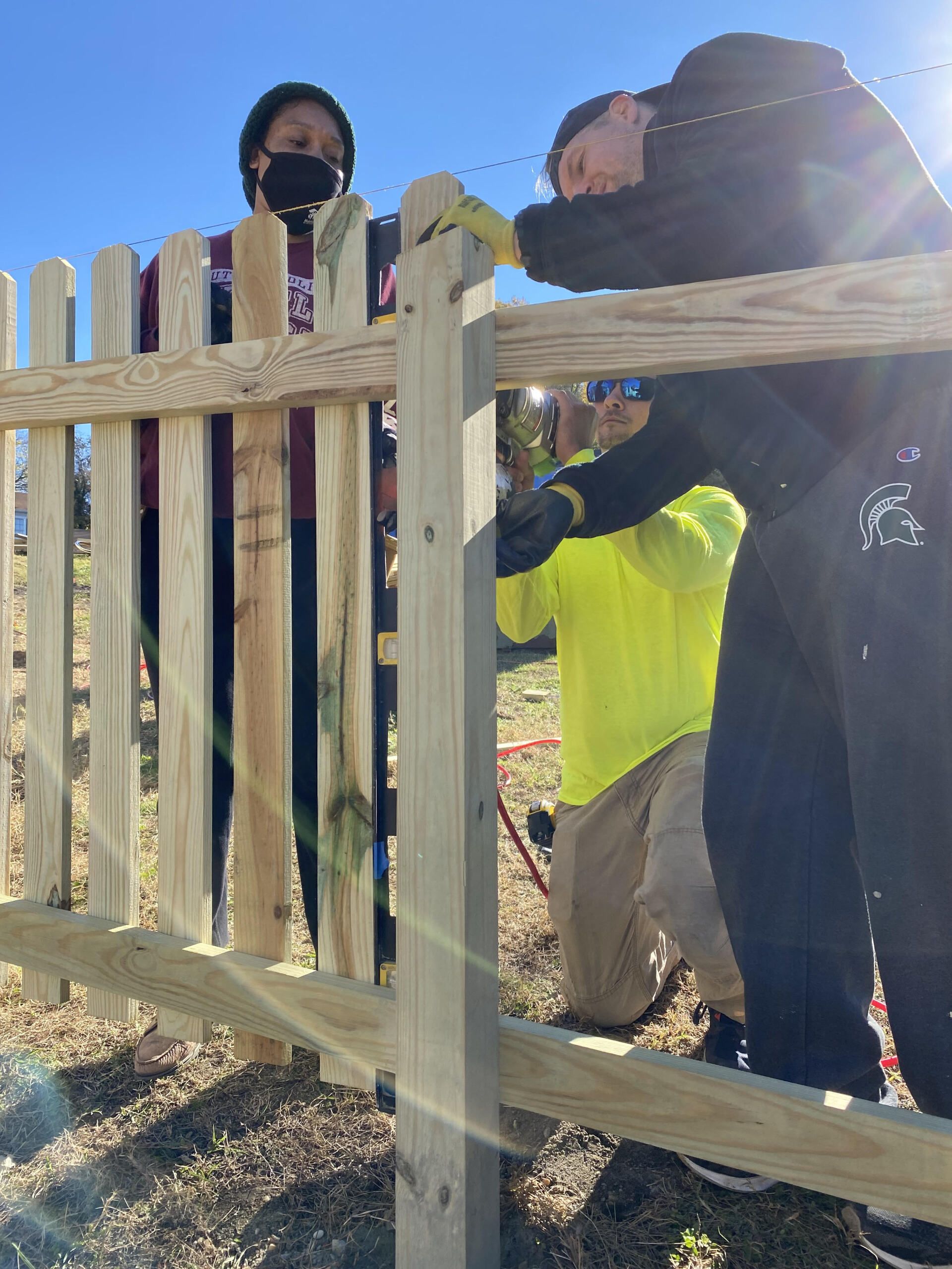 Image of RETEX’s Caleb Kammerling and Mark Erickson volunteering with Richmond Habitat for Humanity in November 2021.