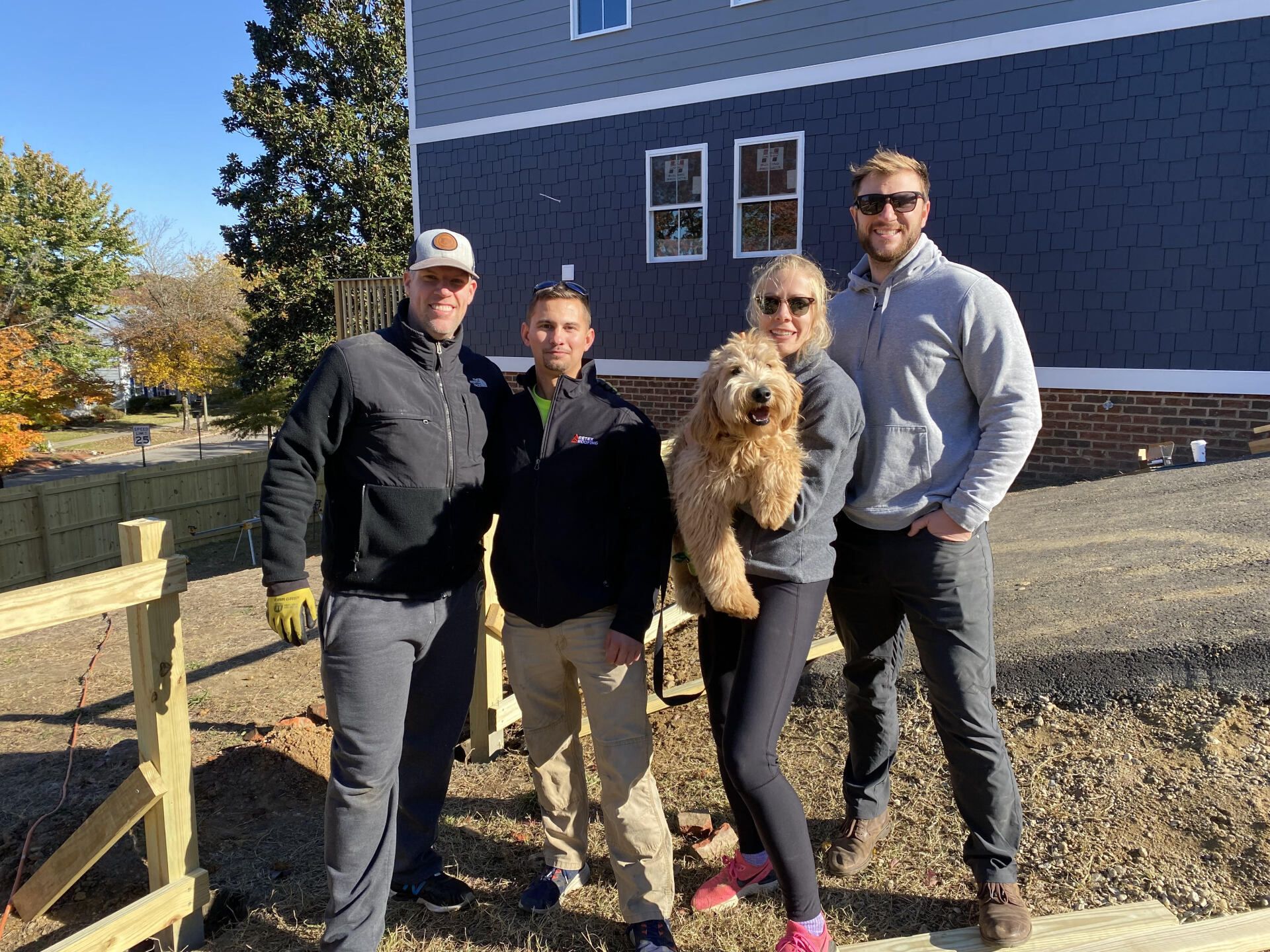 RETEX's Mark Erickson, Caleb Kammerling, Albus, Katelyn & Josh Lewis at Richmond Habitat for Humanity in November 2021.
