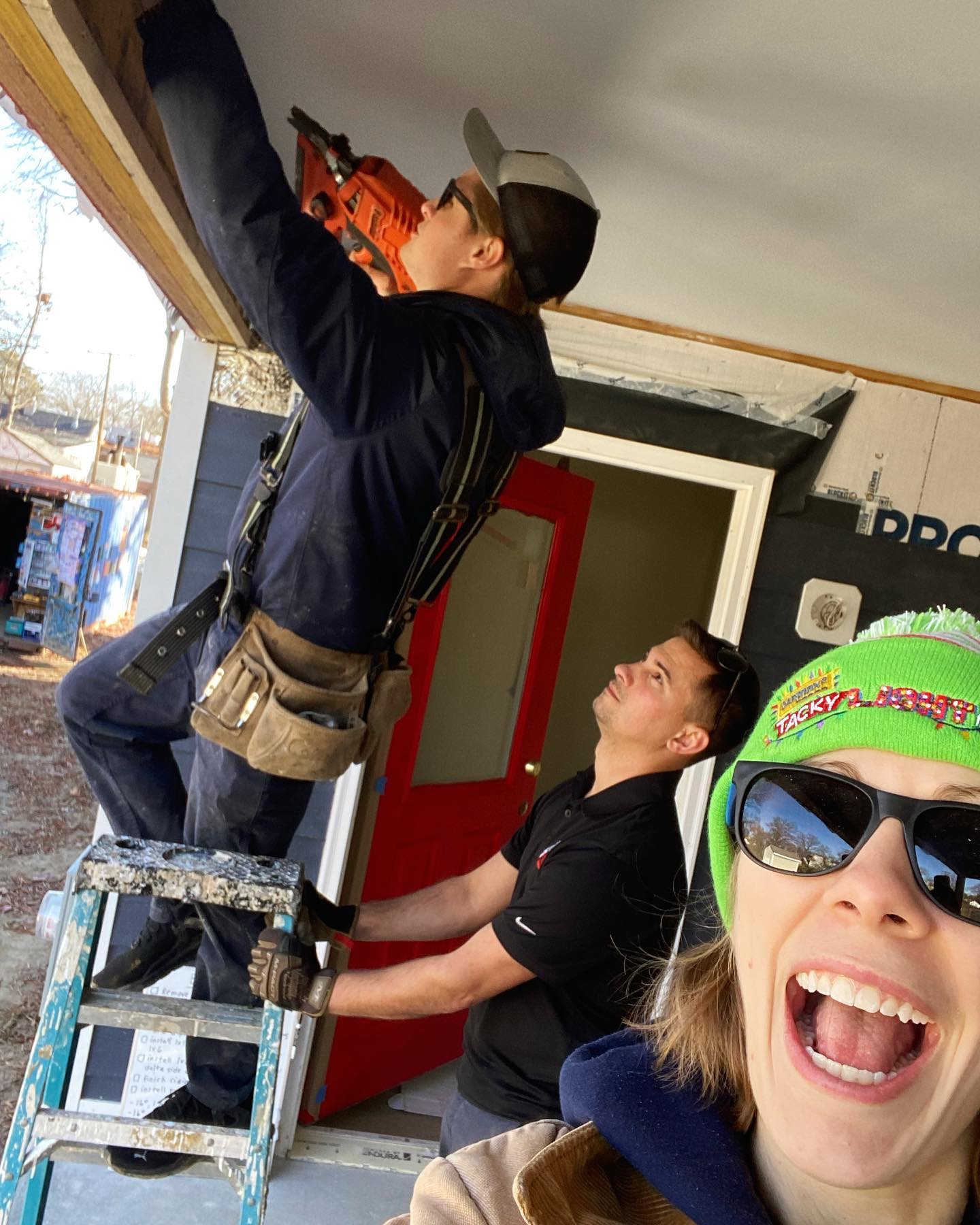 Image of RETEX’s Caleb Hennon, Caleb Kammerling and Katelyn Lewis volunteering with Richmond Habitat for Humanity.