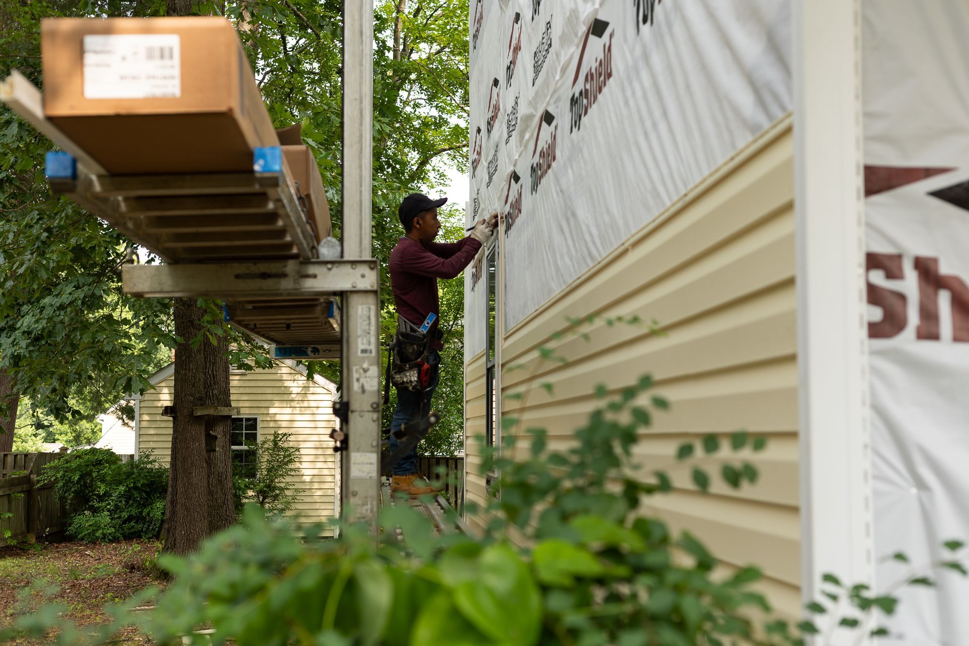A during-installation image of RETEX siding installation in North Chesterfield VA 23235.