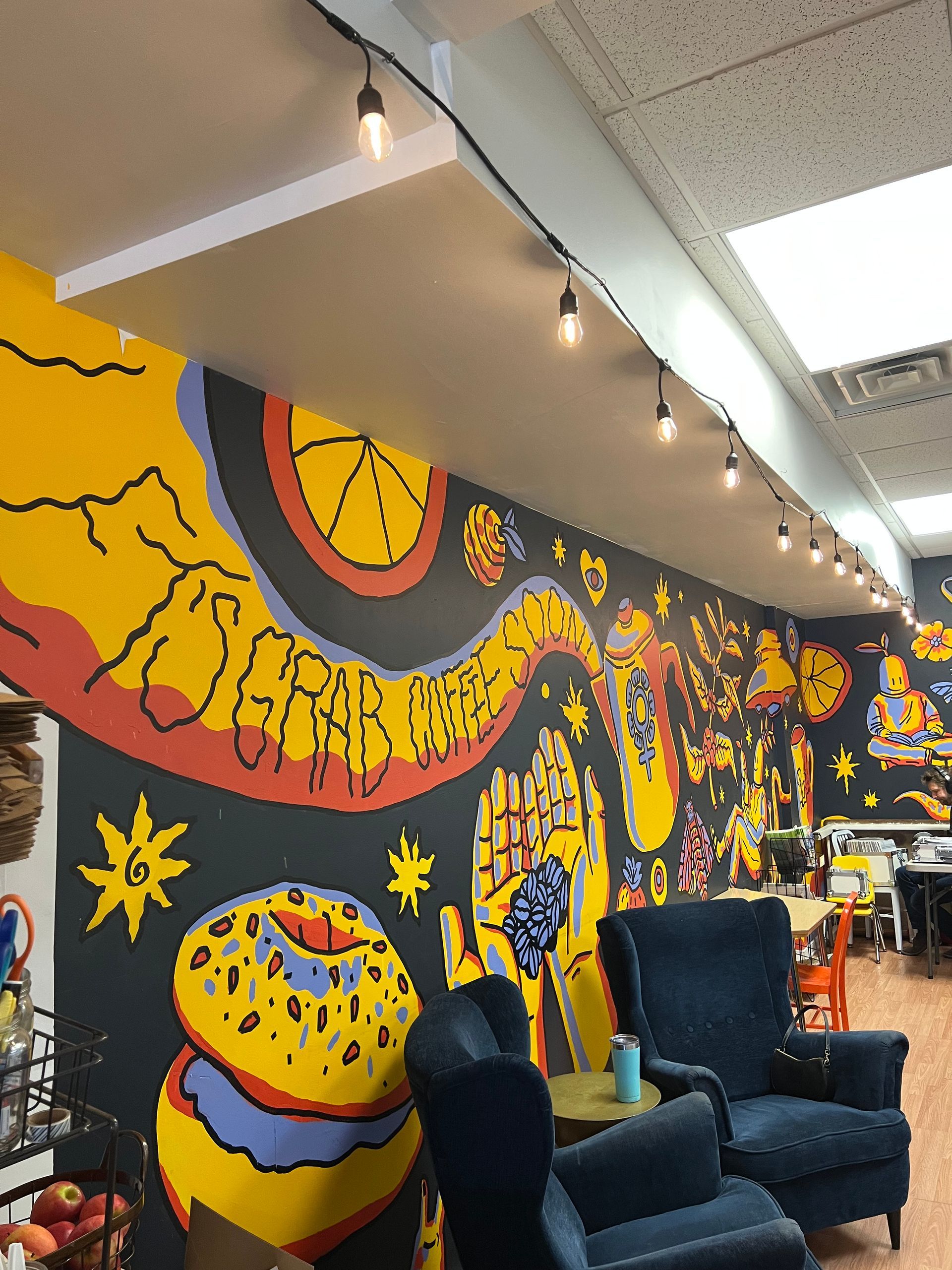 Image of artwork at local coffee shop Perk! in Bon Air, VA. Photo by RETEX's Katelyn Lewis.