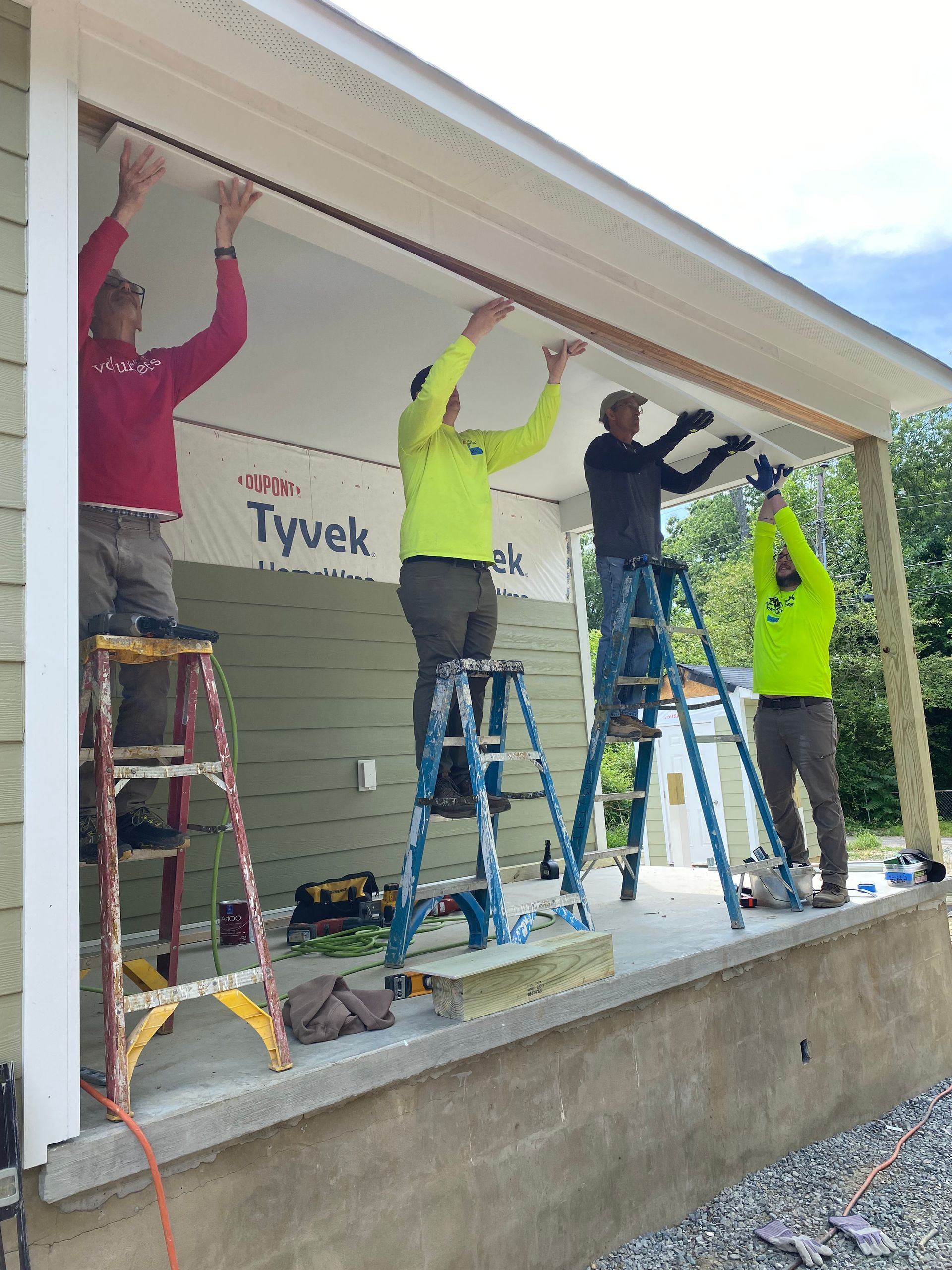 Image of RETEX’s Mark Erickson and Andy Connor volunteering with Richmond Habitat for Humanity in May 2023.