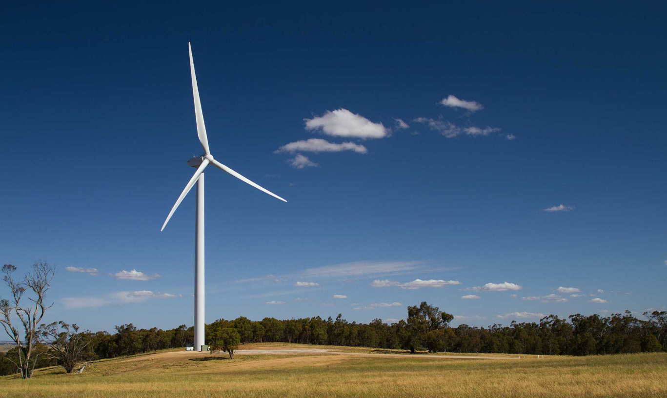 Photo of a wind turbine in a farm in Australia