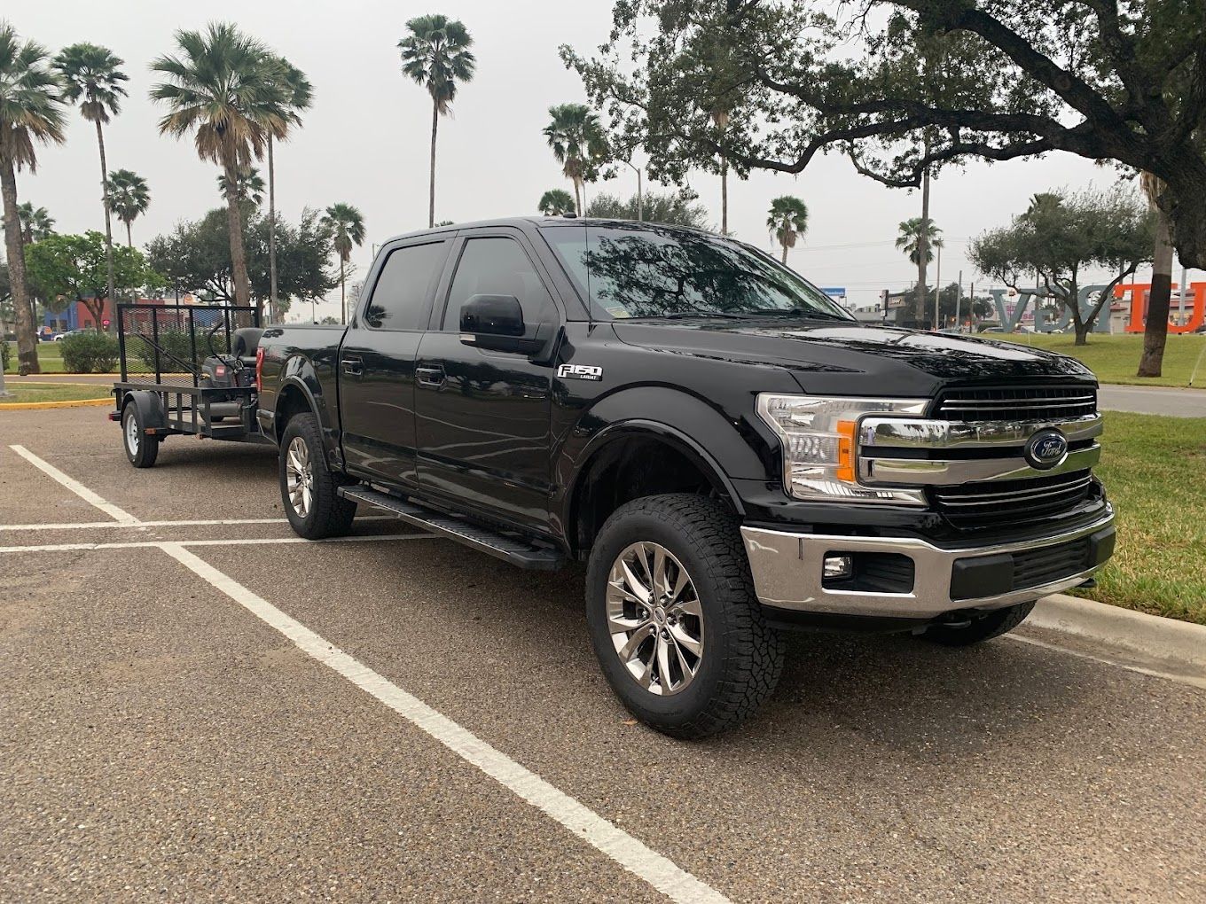 Black Pickup Truck Parked After Detailing Service | Brighton Auto YP