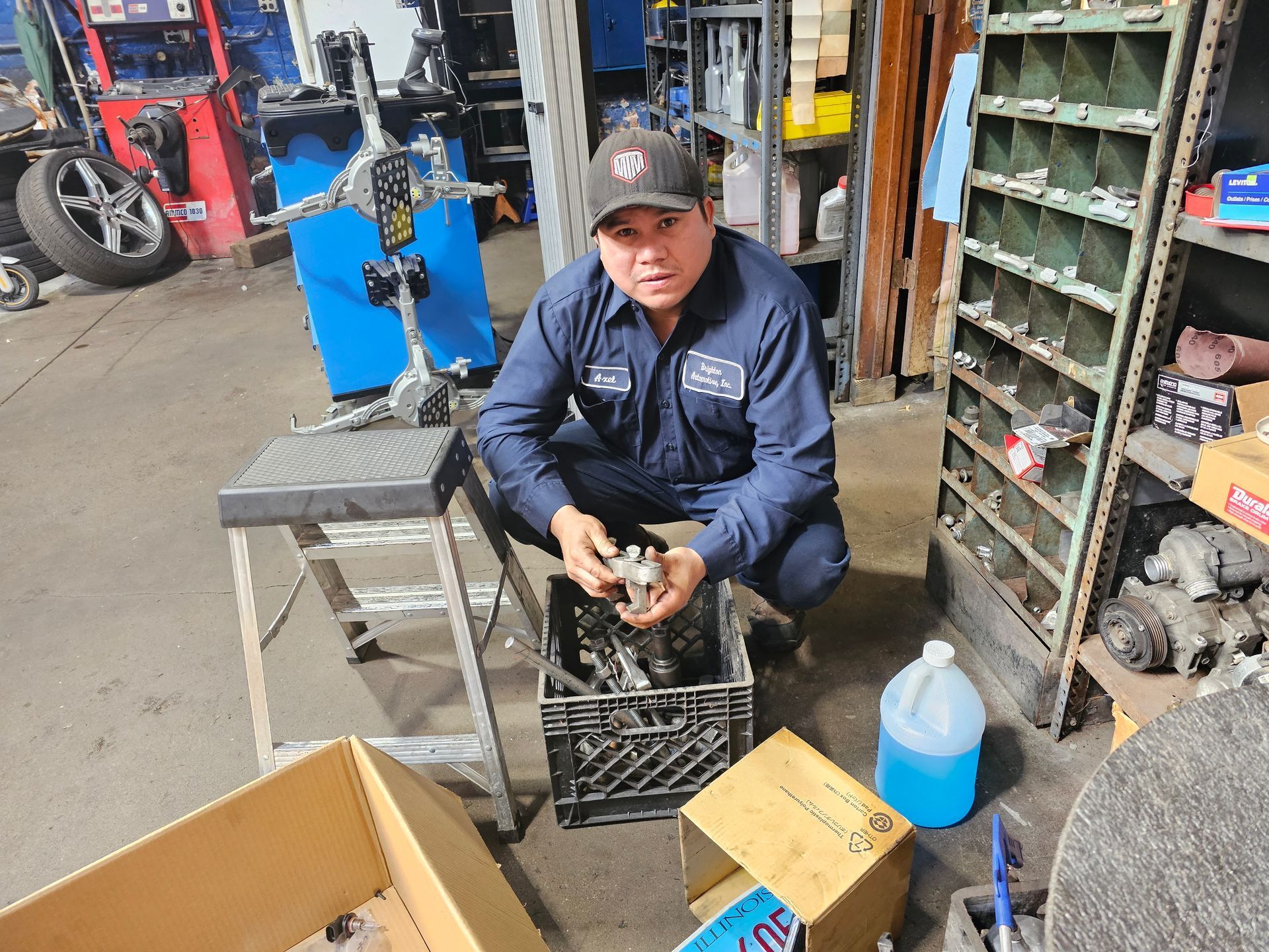 Technician Working On Automotive Parts Bench | Brighton Auto YP