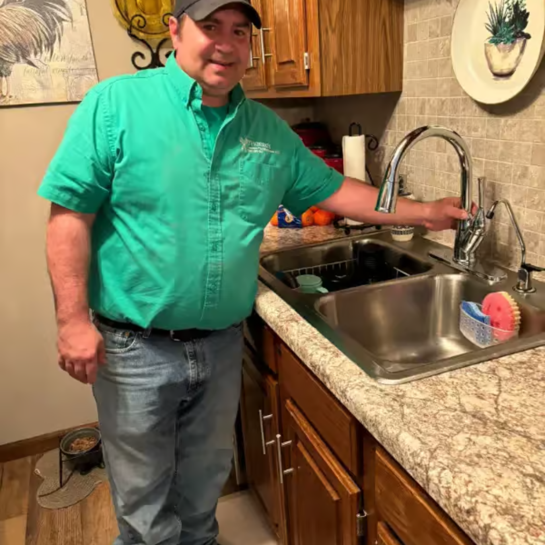 A statue of a mosaic head is sitting on a wooden stump.