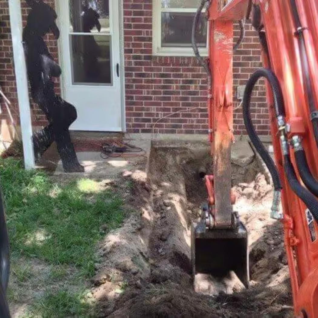 A statue of a mosaic head is sitting on a wooden stump.