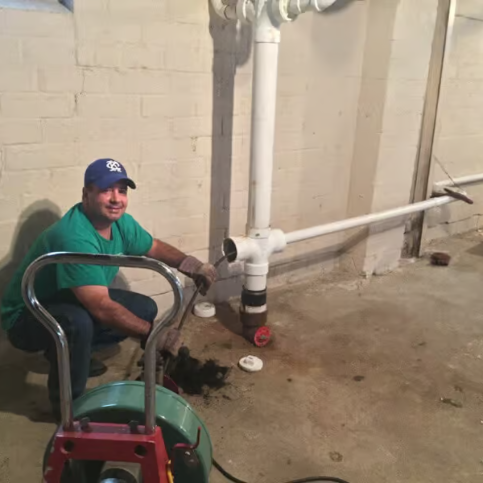 A chair with a yellow pillow and a necklace on it