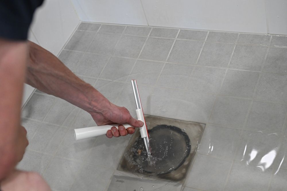 A bunch of incense sticks are sitting on top of each other on a table.